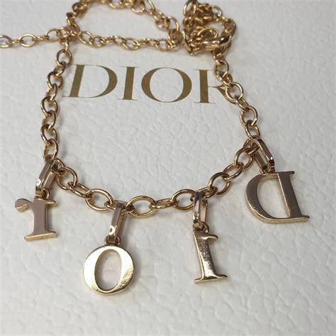 dior necklace revolution|Dior necklace gold letters.